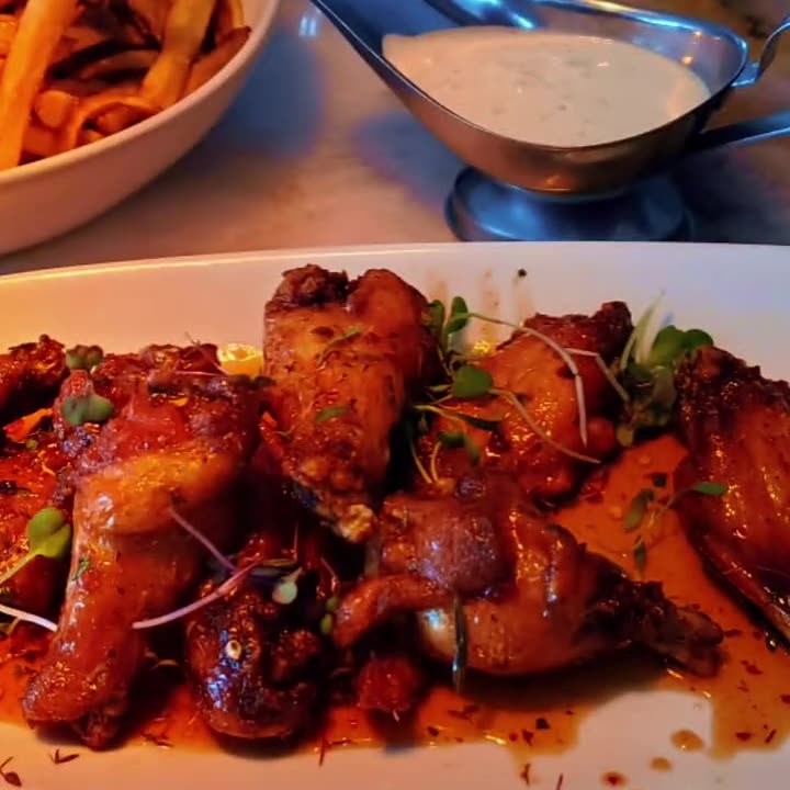 Glazed grilled wings with fries and dipping sauce